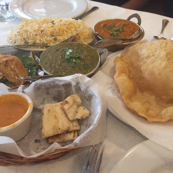 Delicious food and you get a lot for your money. And they put a big bowl of fresh naan (with dipping sauce) on the table when you sit down. We had samosas, saag paneer, and curried chicken.