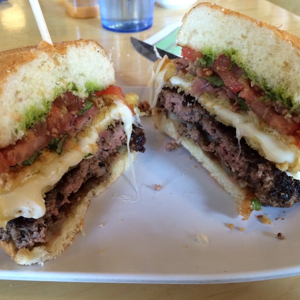 Photo taken at Crave Real Burgers by Lee O. on 5/17/2015