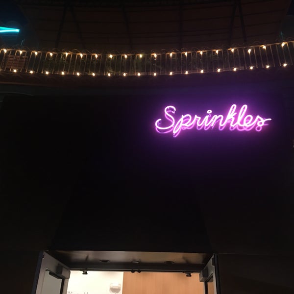 Photo taken at Sprinkles Newport Beach Cupcakes by Michelle P. on 5/1/2017