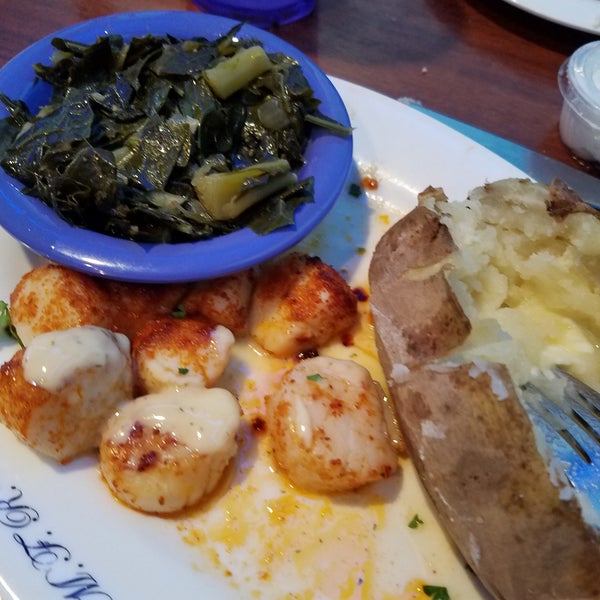 I had the grilled scallops with a naked potato and collard.  Everything was delicious.  Service was great too.