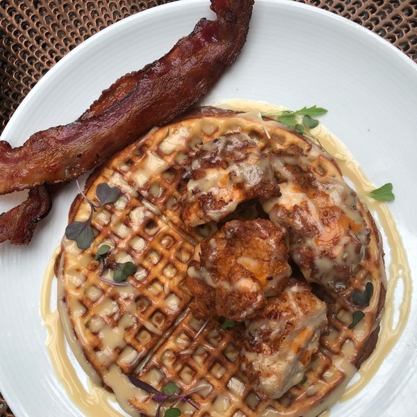 The chicken and waffles are really good. The waffle has bacon cooked into it. Very chill and charming spot in DC. Kinda hidden too.