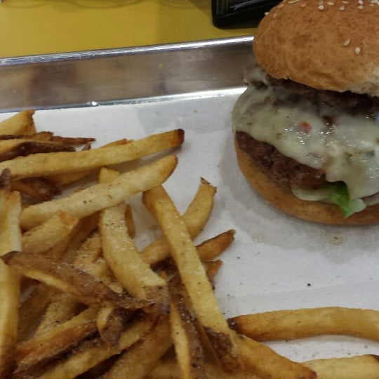 Photo taken at MOOYAH Burgers, Fries &amp; Shakes by J.d. B. on 9/30/2014