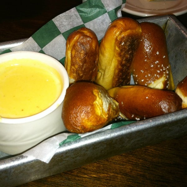 Get the pretzel appetizer but share it between two people!  The 5-cheese dipping sauce is amazing.  The Belgium Raspberry Beer is fabulous also.  I got the grilled chicken salad with feta, yum too!