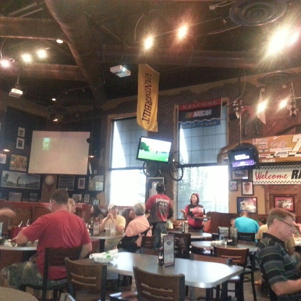 Photo taken at Baumhower&#39;s Wings by Anna M. on 6/15/2013