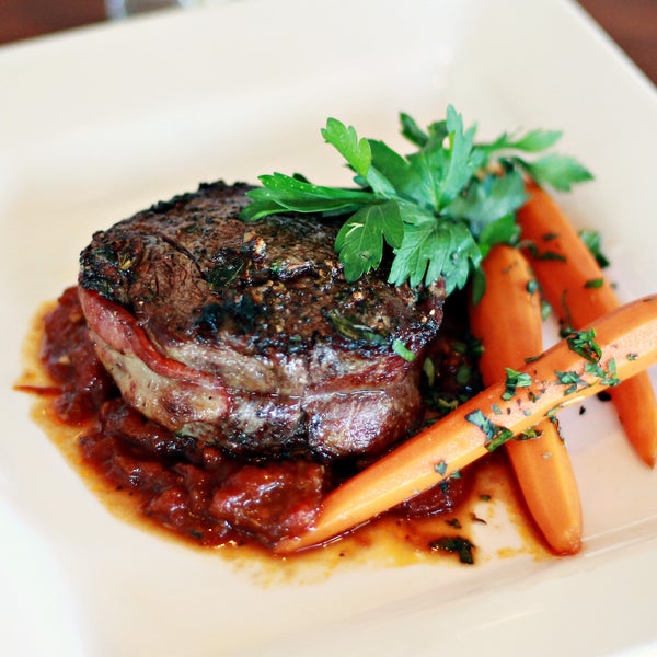 Eight Ounce Bacon Wrapped Filet Mignon and Tomato-Wild Mushroom Ragout ...Bacon and Filet Mignon, awesome!!!   www.regencygrill.com