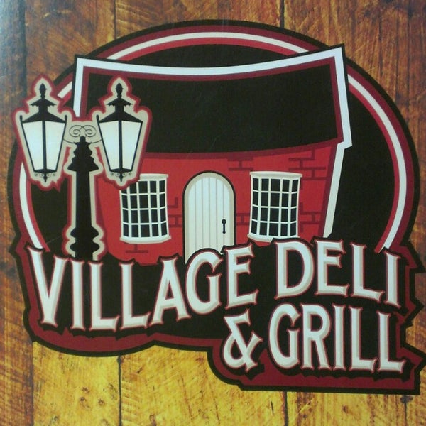 Photo taken at Village Deli &amp; Grill by Marlon L. on 11/6/2012