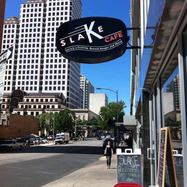 Foto diambil di Slake Cafe &amp; Bar oleh Cymberly P. pada 10/8/2013