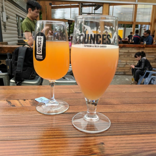 Photo taken at Ounces Taproom &amp; Beer Garden by Jake on 5/18/2018
