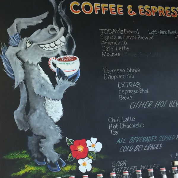 Photo taken at Bad Ass Coffee of Hawaii by Kristina P. on 1/14/2015