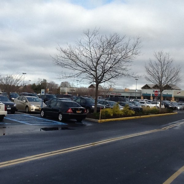 Photo taken at Tanger Outlet Riverhead by ilker g. on 12/21/2012