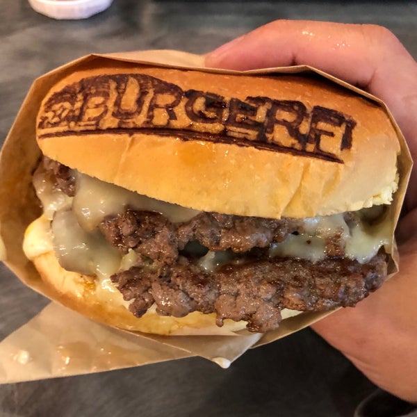 Photo taken at BurgerFi by Thomas on 7/30/2018