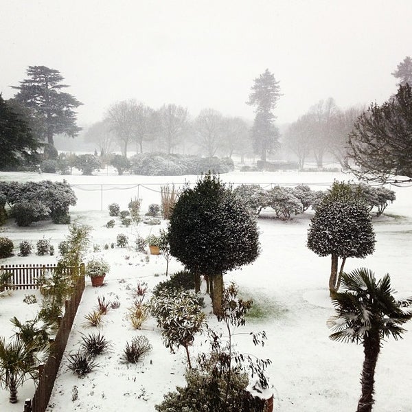 Photo taken at Stoke Park Country Club, Spa &amp; Hotel by Kent V. on 1/18/2013