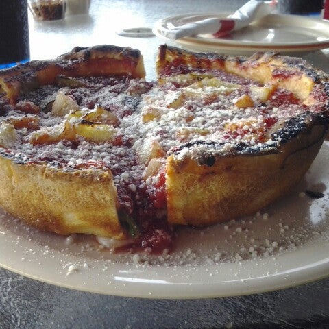 Photo taken at Nancy&#39;s Chicago Pizza by Clinton T. on 11/3/2012