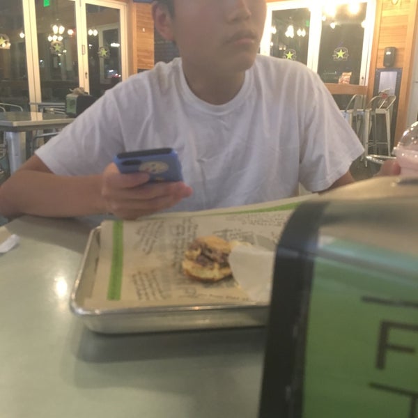 Photo taken at BurgerFi by Andrew H. on 8/29/2016