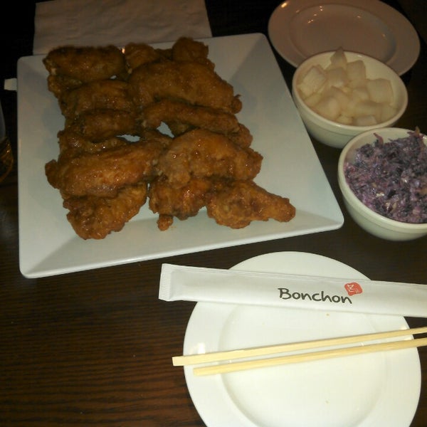 Photo taken at Bonchon Chicken by Karen K. on 2/18/2013
