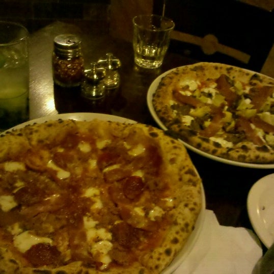 Photo taken at Roscoe&#39;s Neapolitan Pizzeria by Karen K. on 1/26/2013