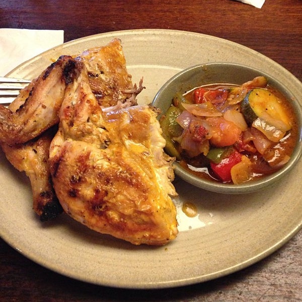 Photo taken at Nando&#39;s by Clinton F. on 6/4/2013
