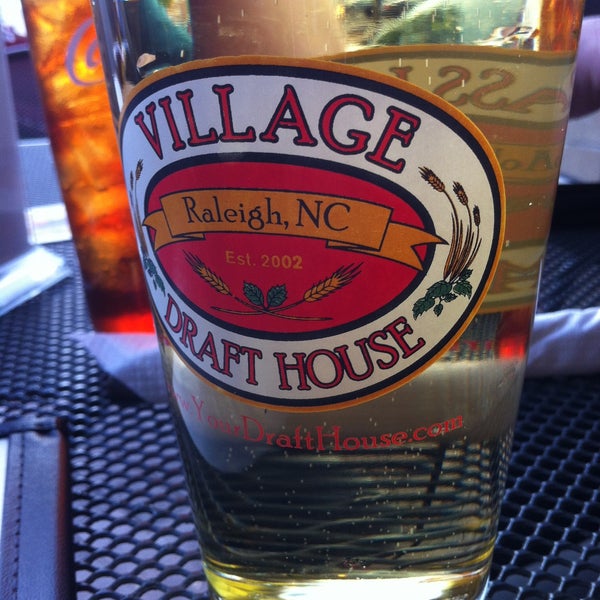 Photo taken at Village Draft House by Teresa B. on 4/20/2013