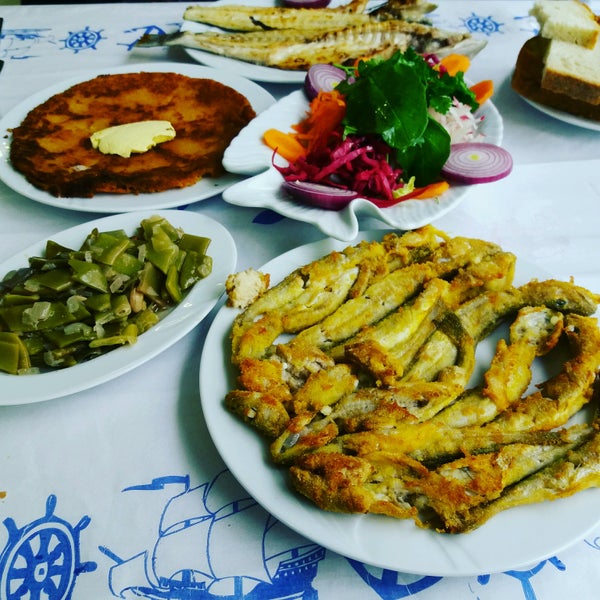 Photo taken at Kıyak Kardeşler Balık Restaurant by Ahmt . on 2/17/2017