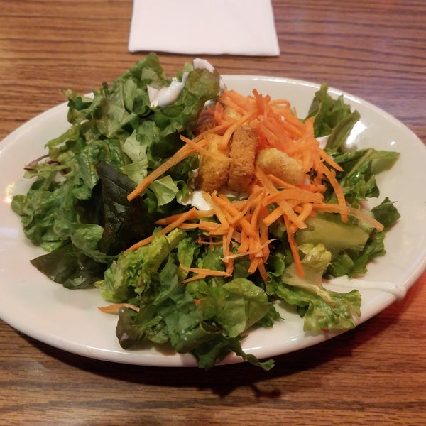 Side salad is great and simple. Big enough, good lettuce and crunchy seasoned croutons, great Bleu cheese dressing, nicely shredded carrot.