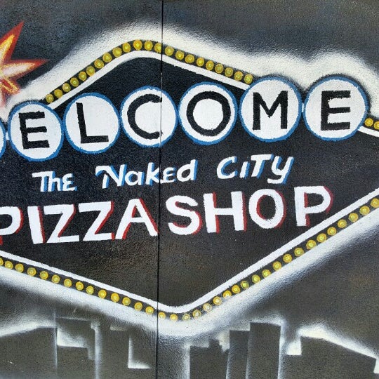 Photo taken at Naked City Pizza Shop by Samanthia M. on 7/5/2016
