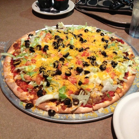 Photo taken at Ricardo&#39;s Pizza by Mitchell C. on 9/23/2012