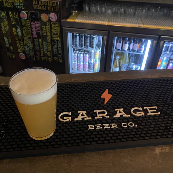 Photo taken at Garage Beer Co. by Robert G. on 10/3/2022