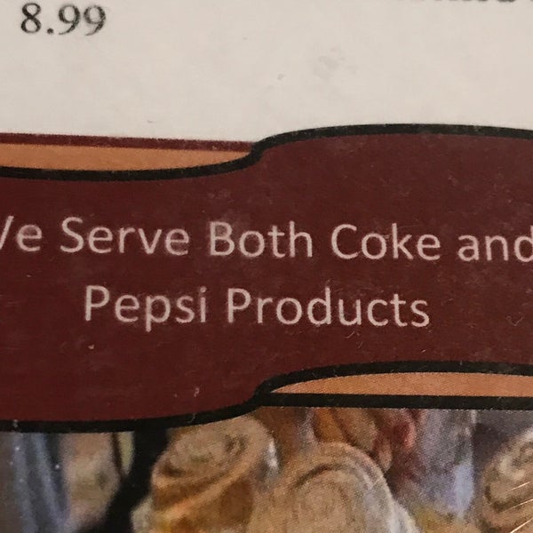 According to the menu, they serve both Coke and Pepsi.