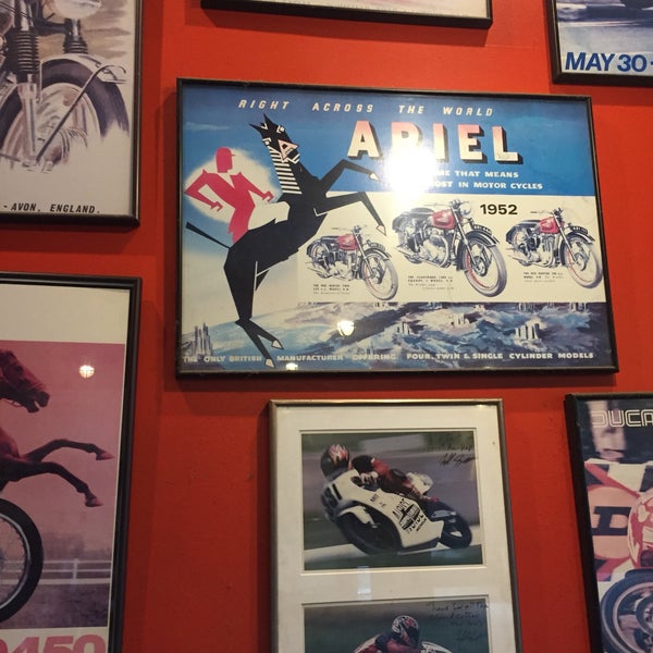 Admire the old cycle photographs and advertisements.