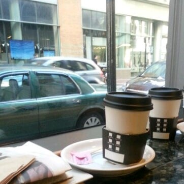 Photo taken at Boston Common Coffee Company by Rebecca L. on 4/29/2013