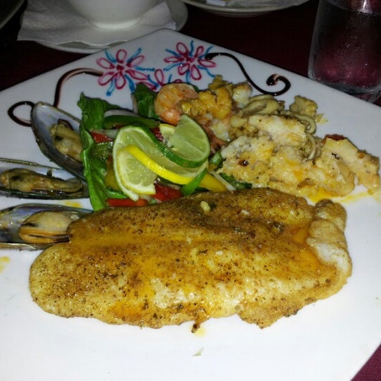 Photo taken at Scampi&#39;s Curacao by Adriana M. on 11/2/2012