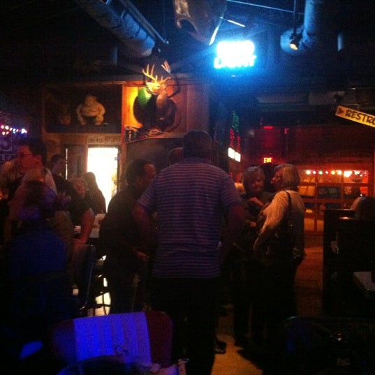Photo taken at Tin Roof Louisville in St.Matthews by Spencer S. on 10/7/2012
