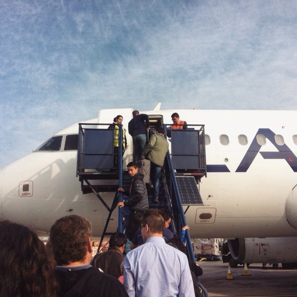 Photo taken at Comodoro Arturo Merino Benitez International Airport (SCL) by Fernando O. on 10/23/2015