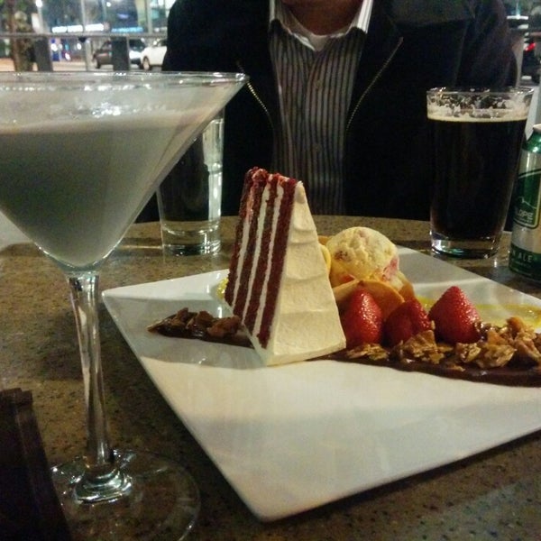 Photo taken at Crave Dessert Bar &amp; Lounge by Mark W. on 5/3/2014