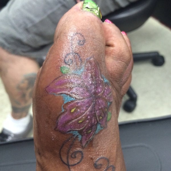 Red Octopus Tattoos - Tattoo Parlor Red Octopus Tattoos - Tattoo Parlor