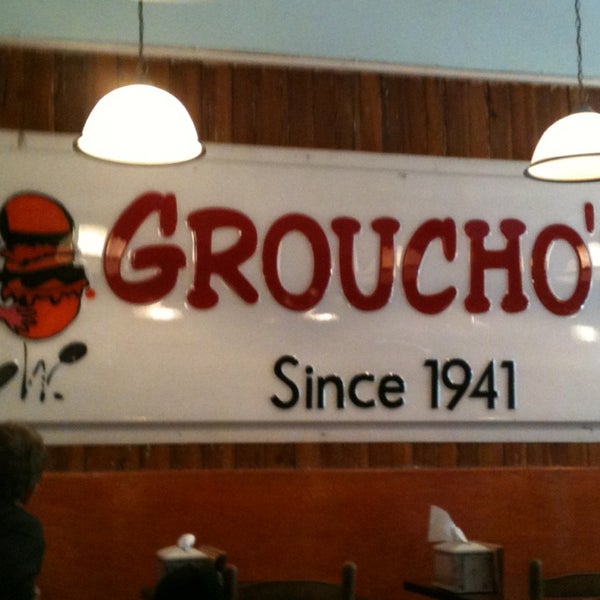 Photo taken at Groucho&#39;s Deli of Charleston by Chris H. on 1/18/2014