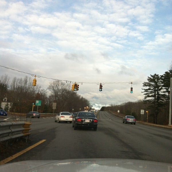 Turn here for West Concord.  Leading right turn arrow.