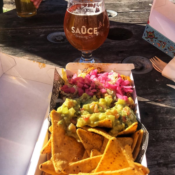 Photo taken at Sauce Brewing Co by W C. on 7/13/2019