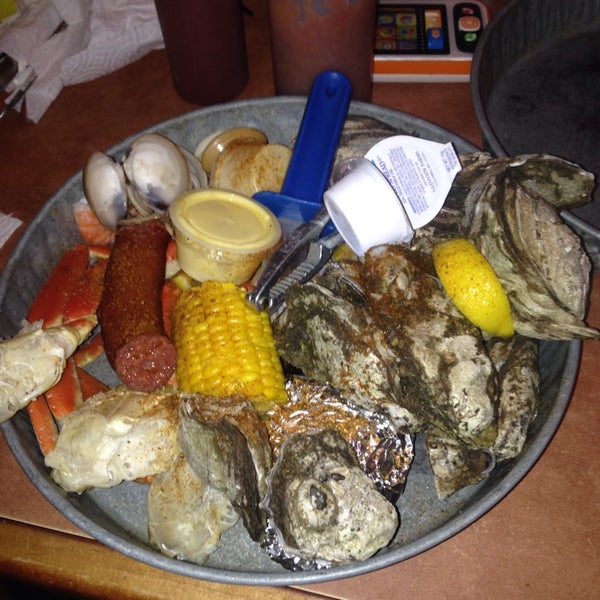 Photo taken at Dirty Don&#39;s Oyster Bar &amp; Grill by Jeremiah A. on 5/6/2014