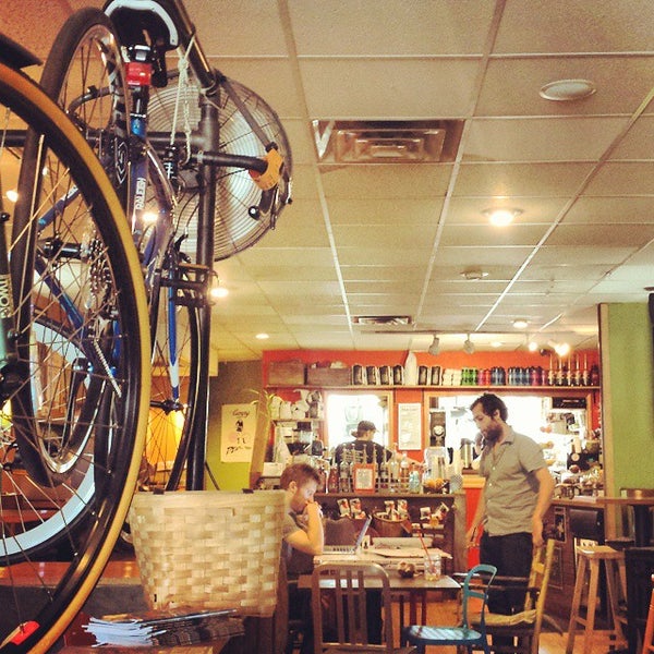 Photo taken at Mello Velo Bicycle Shop and Café by John D. on 10/3/2014