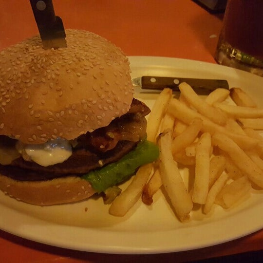 Photo taken at Shark Burgers by Vanny H. on 1/21/2016