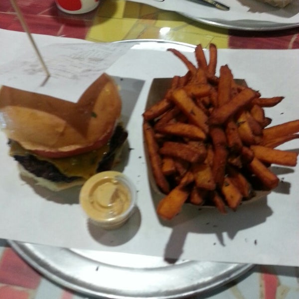Photo taken at BGR: The Burger Joint by Eboné S. on 3/24/2013