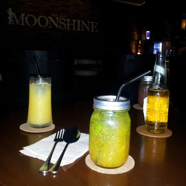 Photo taken at Moonshine Bar by ayah S. on 3/24/2014