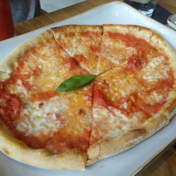 Photo taken at OBICÀ Mozzarella Bar &amp; Pizza E Cucina by Sam S. on 10/3/2014
