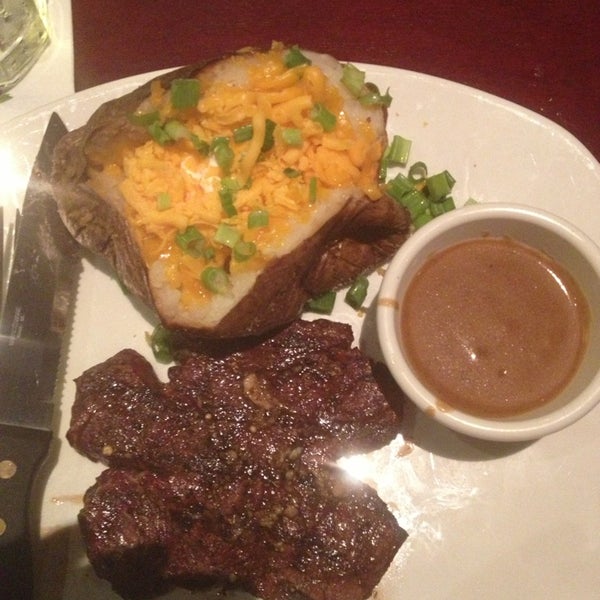 Photo taken at Bâton Rouge Steakhouse &amp; Bar by G on 6/4/2013