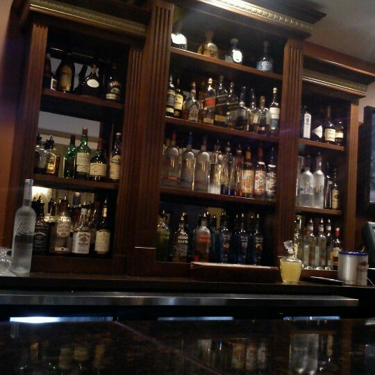 Photo taken at Lira Restaurant &amp; Lounge by Jerel L. on 12/30/2012