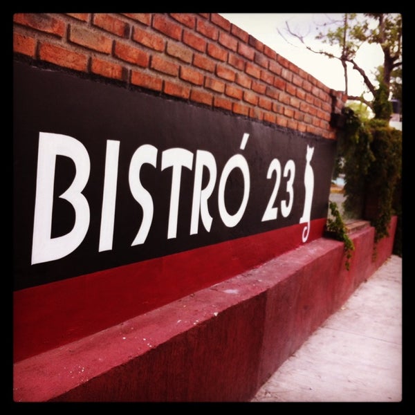 Photo taken at Bistró 23 Café &amp; Terraza by Enrique C. on 9/19/2014