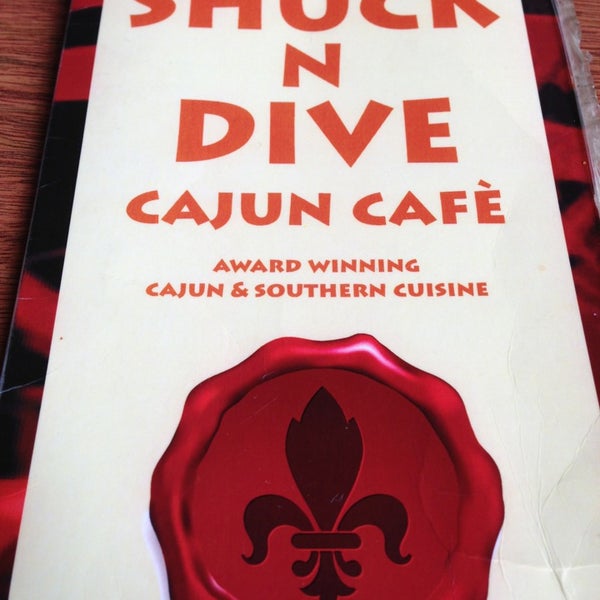 Photo taken at Shuck-N-Dive Cajun Cafe by Jacob E. on 4/7/2013