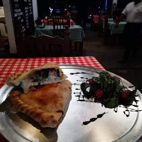 Photo taken at Osteria Marguerita. Pizza a La Leña by Sergio G. on 3/10/2019