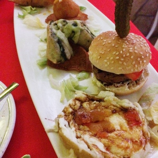 Photo taken at Restaurante Marbella Patio by Elu R. on 8/11/2014